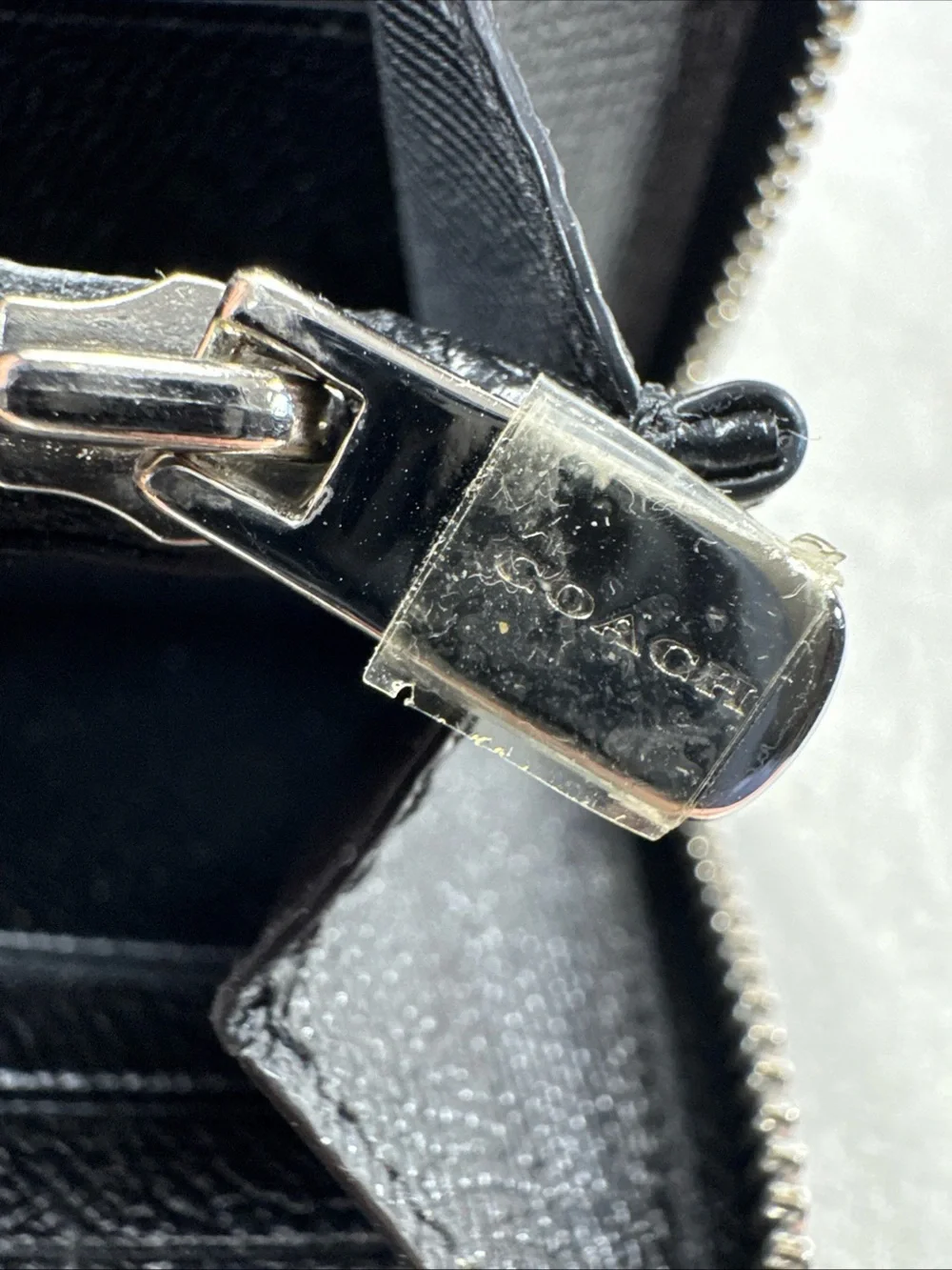 Coach sleek zip